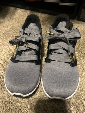 Adidas Gray Athletic Sneakers with Gold Accents